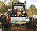 Councillors with children and teachers from Brimrod Primary School, holding their award from North West In Bloom