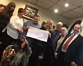 Members of Woodside Social Club: Dianne Harrison, Tracy Davis, Andrew Ashworth, Liz McInnes MP, James Eyre (Club Chairman), Colette Crookes, Jimmy Smith. Front, Jane Holland and Woody the Dementia Dog