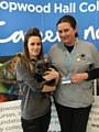 Hopwood Hall College lecturer Penny Dean and a customer with her dog Buddy, a French bulldog