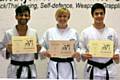 Auwais Mahmood, Christine Crosby and Asad Rana achieve Black Belts 