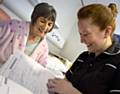 Charlotte Dent, quality matron from medicine, and patient Carol Chadwick at The Royal Oldham Hospital