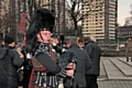 A piper at the Cenotaph service commemorating the end of Gulf War