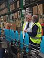 Rochdale Borough Council leader Richard Farnell is given a tour of the McBride site in Middleton