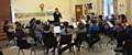 Besses Boys MD Tom Ridgley conducts the first North Manchester Youth Band rehearsal at Middleton Youth Bands band room