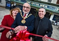 The Mayor and Mayoress, Surinder and Cecile Biant, cut the ribbon with Regal Moon manager Chris Riley