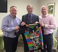 Heroes of Hornets All Time XIII member Chris Churm (right) and Rochdale Hornets Chairman Mark Wynn (left) present the legendary Hornets Coach Frank Myler with a commemorative 'Inspired by Heroes' jersey and medals 