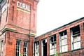 The derelict Coral Mill in Newhey prior to being demolished