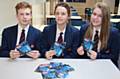 Whitworth Community High School students with their CD, Curby Newsham, Brogan McGarry and Georgia Atherton