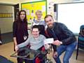 Jordan Deegan, Sixth Form student, being presented with a cheque for £600 by Connor McElleron from Healey Care Ltd  watched by Grand Ball co-ordinator Saj Bibi and Sue Taylor of Healey Care
