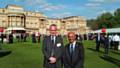 Gareth Swarbrick and Fida Hussain at the Duke of Edinburgh's Gold Award Presentation in the gardens at Buckingham Palace