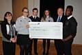 Mark Wiggin CEO Caritas with fundraisers and Head Girl from Holy Family and CE College