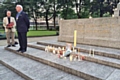 Mayor Ray Dutton speaking at the vigil for Jo Cox watched by the Vicar of Rochdale, Reverend Mark Coleman