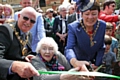 101-year-old Alice Nicholson with Mayor Ray Dutton and Mayoress Elaine Dutton cut the ribbon at the re-opening celebration