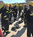 Amber Horrocks, 18, from Middleton (far left), gets a glimpse of life in the fire service