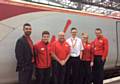 Sam George working with the Virgin trains’ team at Manchester Piccadilly Station