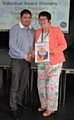 Craig Preston presented with his award by Councillor Janet Emsley