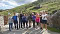 Hopwood Hall College employees who completed the National Three Peaks Challenge at the start of the challenge and at the end