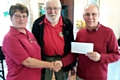 Eileen Taylor, president of the Rochdale Lions Club, Ken Ash, Rochdale Lions and Keith Swift of the Rochdale Blind Welfare Society