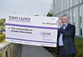 Tony Lloyd presenting big cheque to communities of Greater Manchester