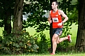 Nathaniel Williams on the canal bank at Kingsway leading the 2016 Rochdale Half Marathon