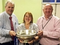 Councillors Richard Farnell and Kathleen Nickson lift the Championship trophy with Hornets' chairman Mark Wynn