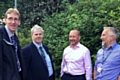 Councillor Richard Farnell shows Taylor Wimpey and Council officials the neglected land at Hurst Meadow fields