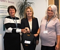 Joy Barlow, Councillor Jaqueline Beswick and Lisa Kimpton with the newly installed defibrillator