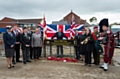 Dignitaries gather at Henry Hill Close at the street unveiling service