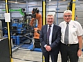 Tony Lloyd and Malcolm Hanson with the ‘million pound plus’ 
 machinery