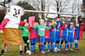 Bridge Juniors Football Club team showing Bertie the Butt the red card