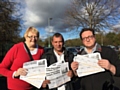 Cllrs Irene Davidson and Andy Kelly with Dave Bamford (centre) and the petition to save Coronation Lodge in Newhey