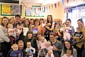 Irene celebrates with Councillor Janet Emsley, and Middleton parents and toddlers 