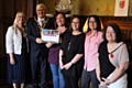 MayorIan Duckworth and Mayoress Christine Duckworth present a certificate of commendation to Angie Howarth, Diane Nattress, Claire Buckley and Jenni Jones