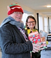 RBH volunteer co-ordinator Brian Lonergan and RBH deputy chief executive Nickie Hallard delivering Christmas shoeboxes