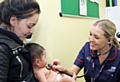 Natalie Horner with daughter Poppy and Donna Pearce, Paediatric Nurse Practitioner