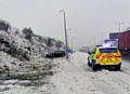 Car skids into embankment on M62