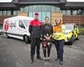 Finn Owens from DPD with Highways England customer service director Melanie Clarke and Highways England traffic officer Vicki Lawton who will be working on Christmas Day to keep traffic moving 