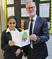 Council Chief Executive Steve Rumbelow with Sana Ahmad at Redwood School with the 2017 Christmas card