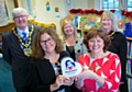 Mayor Ian Duckworth, Sharon Palmer-Johnston (BookStart), Vicky Clarke (Libraries Manager), Irene Peachy and Mayoress Christine Duckworth