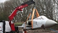 The Tornado is lifted into place at the new firefighter centre