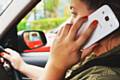 5.6% admitted to using their handheld devices while driving