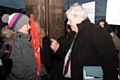 Protesters tackle Leader of the Council Richard Farnell about the massive increase in councllors' allowances on his way into the Council Budget Fixing meeting