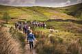 Families walking on a countryside footpath