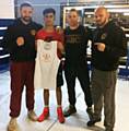 Queensway ABC boxer Zain Ahmed presented with an England commemorative vest 