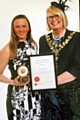 Daisi Daniels presented with her award by the Mayor of Whitworth Madeline De Souza