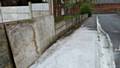 Cement from the Pembroke Court building running into drains on Alma Street, Rochdale