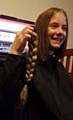 Jasmine with the plait that has gone to The Little Princess Trust to make wigs for a child with hair loss