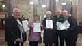 The New Rochdale Pioneers prepare to hand over their petition of 1,200 signatures