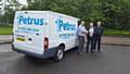 Ian Phair, fleet manager at M&Y Maintenance and Construction, hands keys to Martin Topham of Petrus