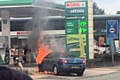 The car burst into flames at the BP petrol station on Bury New Road in Heywood